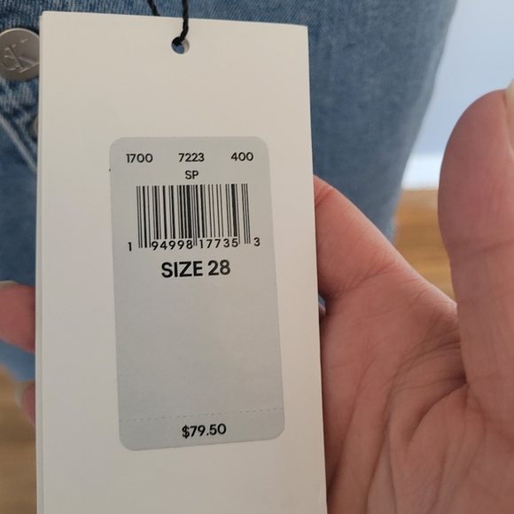 Calvin Klein Pride Denim High Rise Mini, BNWT, Size 28 - Picture 7 of 8
